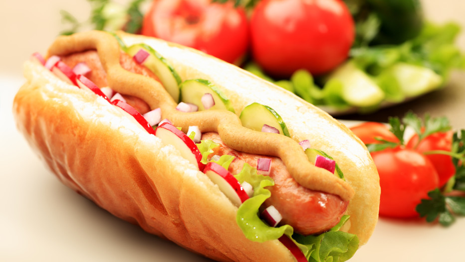 Close up of hot dog. Fast food. Isolated over white background.